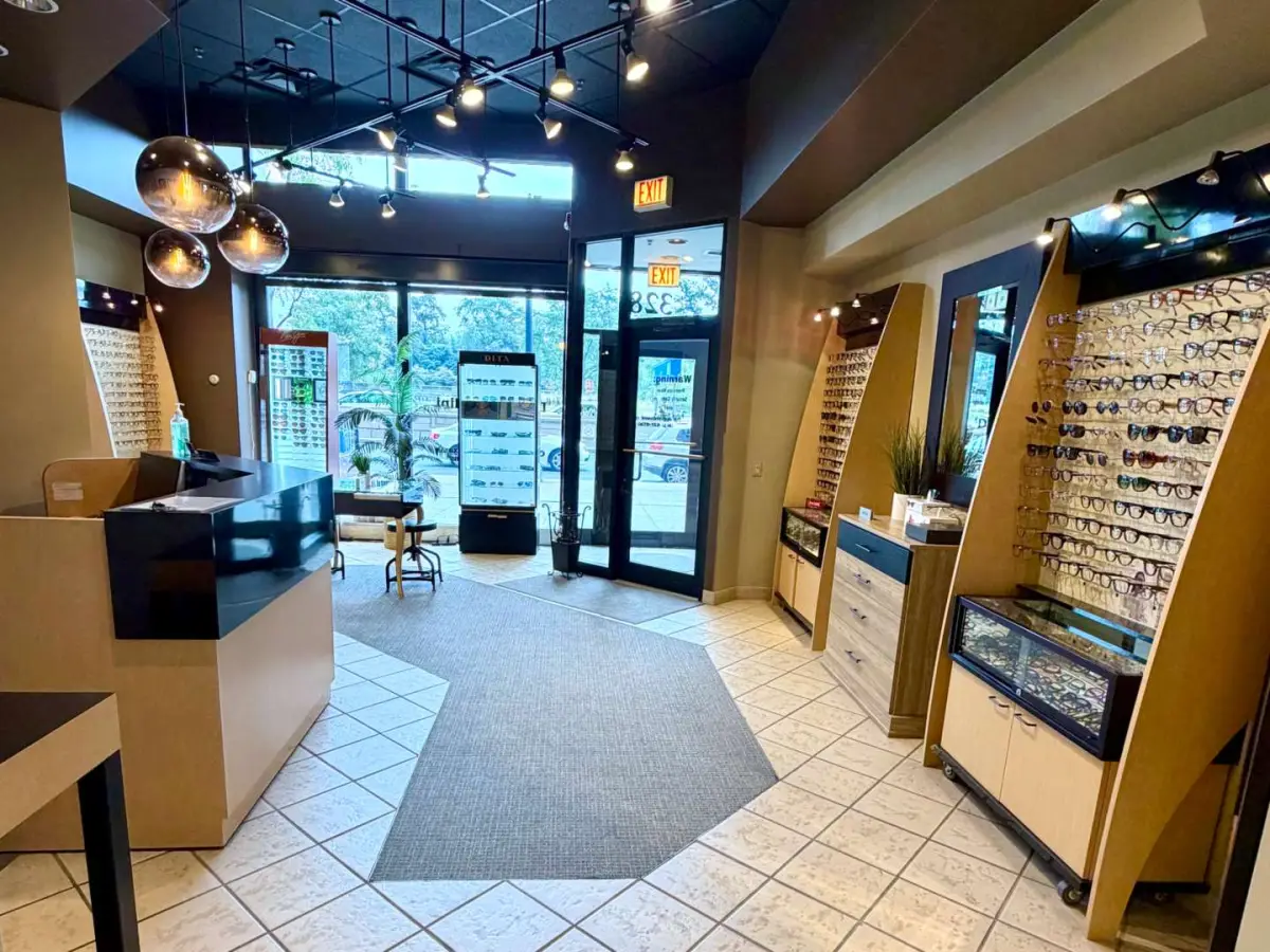 The optical and front entrance of Pelini Eyecare at 328 S. Michigan Ave., with frame displays and windows onto Michigan Avenue